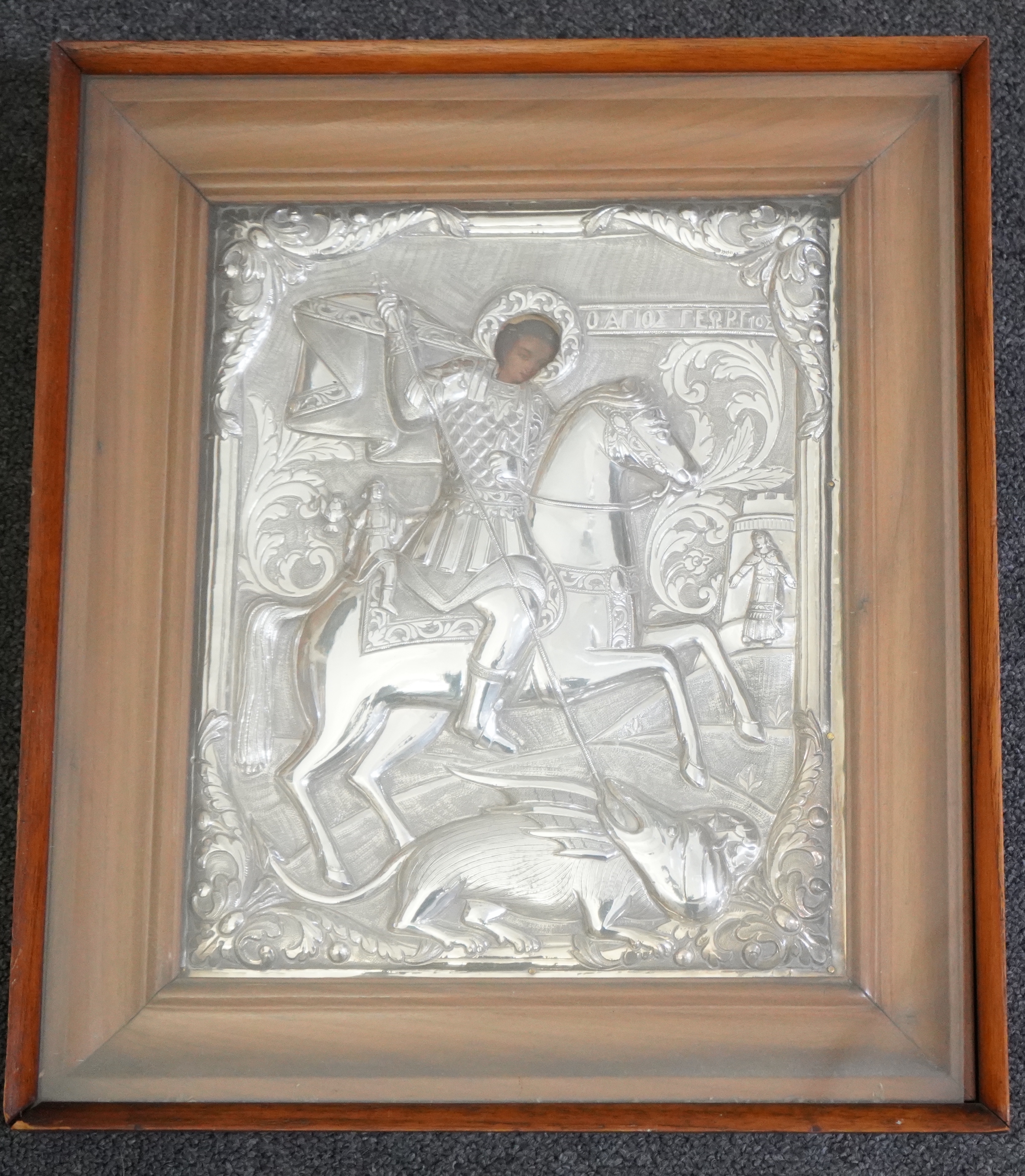 19th century Greek School , St George and the dragon, icon with silver oklad, 28 x 24cm